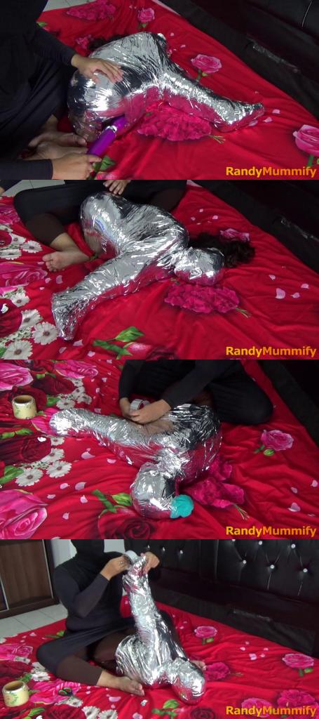 [RM132] A girl is wrapped tightly in a difficult Sitting position with chrome duct tape This beautiful girl was wrapped in a sitting position with plastic and covered with chrome felt, making her helpless.<br>This girls body is wrapped in such a way that it is helpless and then stimulated with a vibrator.