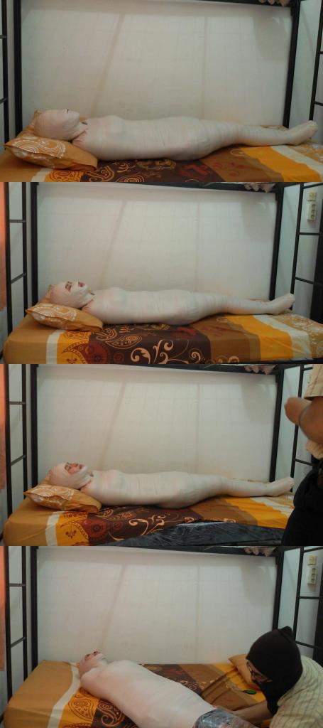 [RM016] A girl is mummified in the boarding room A girl tries to be mummified in her boarding room.<br>This girl was wrapped tightly with her eyes open at first because the model was frightened, but after being persuaded finally this girl was willing to have her eyes wrapped.