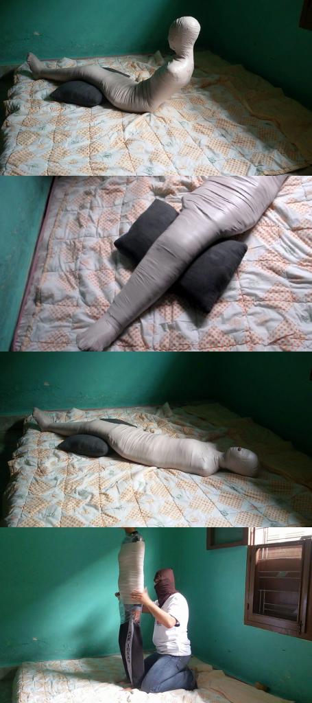 [RM017] A girl in a training costume wrapped up in a mummy in the bedroom (Some part broken)<br><br>A cute girl tries to be mummified in her bedroom.<br>The girls body was tightly wrapped with white duct tape so it was difficult to move.<br>But because of fear, this girl was able to fight violently until she sat down.