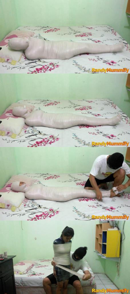 [RM036] A girl struggles after being mummified A beautiful girl is wrapped tightly in white duct tape on the bed.<br>The girls entire body was wrapped and leaving only a small tube in her mouth for breathing.<br>This girl was struggling trying to get away.