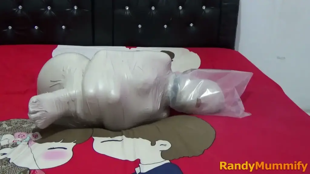 [RM072] This Girl Was Helpless When Put In Car Because Her Body Was Wrapped Tightly In Mummy This beautiful girl was wrapped in white duct tape in a sitting position which made her body helpless and unable to move.