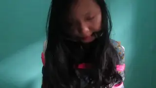 Indonesian Girl Gagged (ID-BOUND028) Indonesian Girl Gagged in a Basement Room