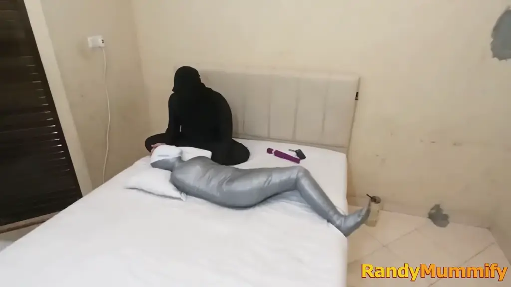 [RM150] A girl was mummified in white and grey duct tape and then her breath was sealed A girl is wrapped into a mummy with white duct tape until her body is tight, then added with ash tape to make the girl move.<br>After being helpless, this girl's body was toyed with and tortured by playing with her breath.