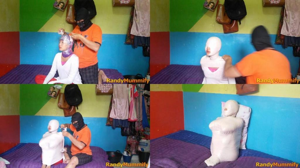 [POV] Main Scene Of RandyMummify RM009 A girl is mummified in a rented boarding room.<br>This girl's body is wrapped in a sitting pose with duct tape until her body is totally motionless