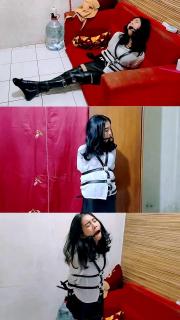 Beautiful Indonesian Girl Tied Up Beautiful Indonesian Girl Tied with leather straps and a ballgag attached to her mouth