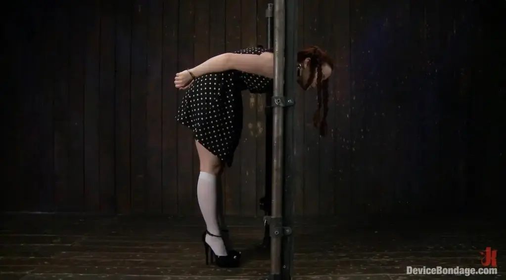 Pig Annabelle Lee is as cute as they come. Her youthful face gives us the illusion of far deeper fantasies. In scene one, pig is trapped by the neck in a standing stock. Her shoes are drilled into the floor and she is handcuffed. She earns the name pig by her snorting laughter when she is tickled mercilessly. This earns her a pig nose, pig tails, and a pig butt plug. Second, pig is bent into a challenging back arch. Claire takes advantage of Anabelle’s tiny bush tormenting her with the mean black clips all over her cunt hair and then ripping the clips off. Third, pig gets her fuck hole greased and primed to be pummeled with the fucking machine. Her incredibly sensitive feet get tormented with the tazapper and more tickling. Her orgasms are so intense they seem almost painful. Cum watch this bitch repetitively explode and surrender to unforgiving metal, wood, and leather.