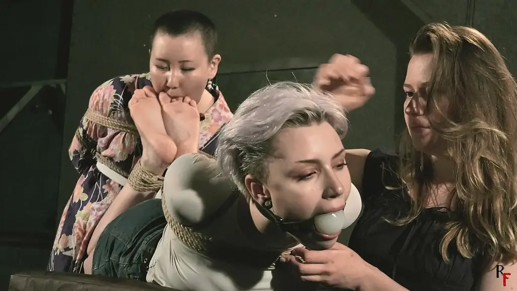 Mila enjoys bondage and foot worship with Madoka and Astrid (FULL HD MP4) By John<br><br>Tonight there's a rare guest - Mila, a lover of bondage adventures, fetishes and soft BDSM, has fun with two girls who are also no strangers to her hobbies. You know them very well - Astrid and Madoka. Unlike Mila, who identifies herself strictly as a dominatrix, these two cuties are submissive. It's a match!<br><br>It all starts with Mila tying Astrid into a hogtie and gagging her. Madoka, already with her hands tied, awaits orders from Mila. When Astrid finds herself fully bound, Madoka's time comes. Mila leads her to Astrid's feet and makes her suck Astrid's toes and licks her soles. Madoka happily begins to do so.<br><br>Mila watches all this and, getting a desire for Madoka to lick her feet as well. Mila sits down on the bench next to the hogtied Astrid, putting Madoka on her knees, making her worship her feet. Mila has very pretty feet, and Madoka enjoys that too, foot-fetish is one of her favorite pastimes.<br>Enjoy!