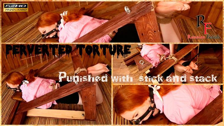 Perverted Bastinado Punished with stick and stack (FullHD 1080p) The punishment of a young red-haired girl in uncomfortable position. She is tied to a special wooden structure. Her pose looks like hogtie - hands and feet are tied and she ballgagged. She's very sensetive to pain, so I'm starting to hit her with rare but strong blows. First I take a stick and then a stack that produces a burning effect on her soles. Then I make stronger blows from which she howls shrilly.<br>At the end I'm doing very frequent short blows with a stick. Saliva flowing from her mouth and she's in pain, but she struggles and tolerate it quite well!<br><br><br>READ LESS<br>Category: BASTINADO<br>Related Categories: BASTINADO, BALLGAGGED, BONDAGE.<br>Keywords: feet, gagged, falaka, sole, punishment, drooling.