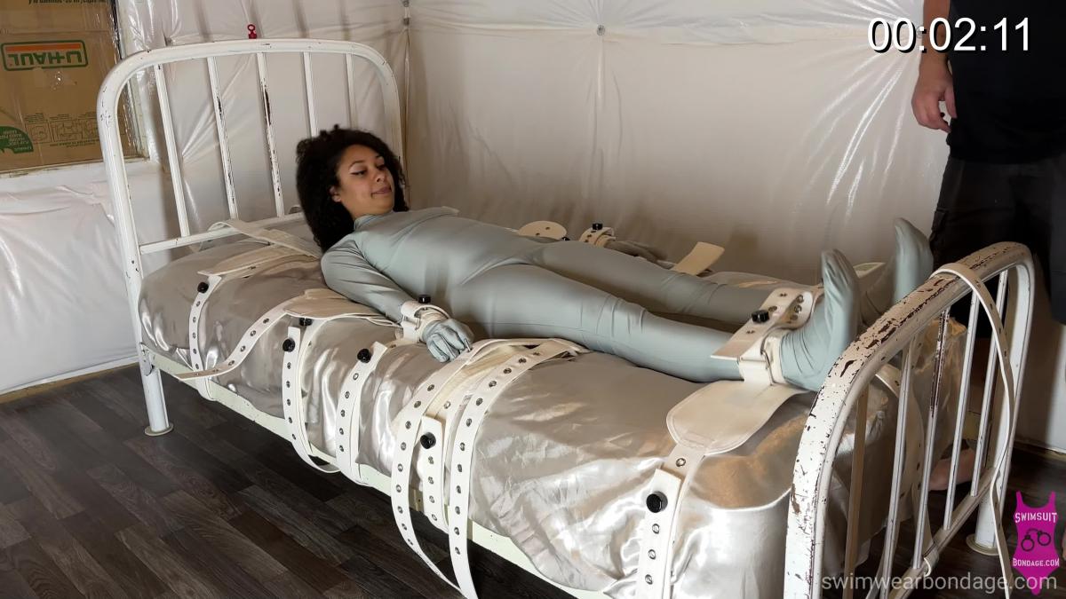 384 Princess Sophia first time in segufix Princess Sophia get to try out the Segufix for the first time. watch her wiggle and squirm in her silver spandex catsuit and try to escape her spandex bondage.