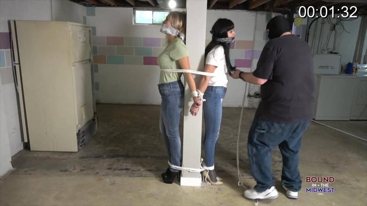 Blair Blouson &amp; Lilmizzunique Tied To The Post Blair and Unique are wearing shirts jeans pantyhose and heels and tied up and gagged in the basement trying to get free. <br><br>Category: BONDAGE<br>Related Categories: DID, ROPE BONDAGE, GAGGED WOMEN, JEANS FETISH, PREDICAMENT BONDAGE.<br>Keywords: blair blouson, lilmizzunique, bound, gagged, tied up, tight, cleave gagged, pantyhose, rope, hottie, mmph, predicament. 