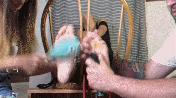 TheTickleRoom - Monica's Sensitivity Training I am gonna keep this short and sweet (I am late to a meeting with a new model lol). Monica starts with shoes and socks in the chair. Me and Coco remove her shoes and socks. We tickle her BIG FEET bare with NO toe ties to start. Then we start to add soap and water SCRUBBING her soles clean with brushes and the electric toothbrush. Then we heat things up with a blowdryer. I rarely do this since I believe it dries soles out even with lotion. But here its VERY effective. We go slow to see how she is feeling......not very well. THEN we add the toe tie and TONS of oil. I must say I was VERY proud of my toe tie job on this one. This is simple. Me and Coco go as HARD as possible. Monica has a high tolerance but with our long nails and brushes she cracks QUICKLY before she breaks "I FUCKING HATE YOU GUYS!!!!". I know you all love the Monica torture clips so here is another one.....with her revenge coming soon....