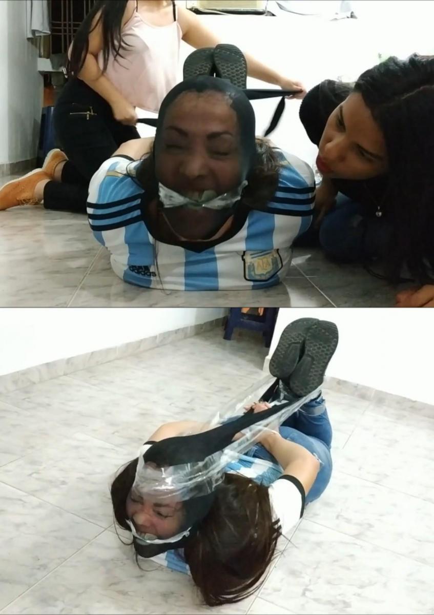 Laura, Katherine &amp; Maria Martinez in: Owning Step-Mom: Tag-Teamed, Hogtied &amp; Humiliated By H Laura, Katherine & Maria Martinez in: Owning Step-Mom: Tag-Teamed, Hogtied & Humiliated By Her Evil Brat Daughters! (high res mp4)今天是星期天下午，我们现实生活中甜蜜的拉丁娜姐妹凯瑟琳和玛丽亚想去看电影。<br><br><br><br>女孩们走进继母的卧室，性感的继母劳拉正忙着看书。玛丽亚和凯瑟琳向继母劳拉要钱外出，但劳拉希望女孩们今天呆在家里，拒绝给她们任何东西。<br><br><br><br>由于A计划没有成功，大继妹凯瑟琳和她的小继妹玛丽亚决定选择B计划，所以女孩们为了得到他们的遗嘱而袭击了继母劳拉。玛丽亚和凯瑟琳对他们的继母变得严厉而有统治力，他们把她绑起来，准备让她沉默。<br><br><br><br>凯瑟琳大声叫劳拉闭嘴，并用手捂住她的嘴，而小妹妹玛丽亚则在继母腿上系完最后一根带子。然后，玛丽亚让继母沉默，让她的手与凯瑟琳的手重叠，进行一个愉快、轻松、平稳的过渡，这样继母就没有机会说话了。<br><br><br><br>小玛丽亚紧紧抓住继母，在继母面前炫耀一条白色的破旧丁字裤，这让她和凯瑟琳非常享受。玛丽亚把内裤塞进继母的嘴里，并与准备穿一条黑色连裤袜的大姐姐凯瑟琳合作。<br><br><br><br>凯瑟琳把连裤袜拖到继母塞满内裤的脸上，让继母裹得严严实实。然后，她把几层透明的包装胶带缠绕到继母塞满的嘴里，并从尼龙帽外面绕在她的头上，让继母成为一个漂亮而紧密的胶带切割口，以保持沉默的内裤。<br><br><br><br>继母劳拉在邪恶的女儿们的严密护送下，被迫站起来跳进另一个房间。连裤袜连帽MILF被放在地板上，大姐姐Katherine用胶带把她绑住，把连裤袜头的松散部分一直绑到脚踝，并与Maria合作，用胶带把胶带绕在继母的额头上，一直绑到她的脚踝，然后再绕回来，让继母的头高高举起。<br><br><br><br>女孩们玩得很开心，羞辱了她们的继母，继母看起来像一只小猪，鼻子都被尼龙包裹着。现在姐妹俩的工作已经完成了，凯瑟琳拿起继母的包，在她扭曲的脸前炫耀一大笔钱。女孩们向继母劳拉道别，然后去电影院看电影，劳拉咕哝着，抗议着，为自己的自由而战！多么邪恶的一对小淘气！It's Sunday afternoon and our sweet real-life latina sisters Katherine and Maria want to go to the cinema.<br><br>The girls walk into step-mom's bedroom where their sexy step-mom Laura is busy reading a book. Maria and Katherine are asking step-mom Laura for money to go out but Laura want the girls to stay home today and refuse to give them anything.<br><br>Since Plan A didn't work out big step-sister Katherine and her little step-sister Maria decides to go with Plan B and so the girls attack step-mom Laura in order to get their will. Maria and Katherine turns strict and dominant towards their step-mom as they tie her up and prepare to silence her.<br><br>Katherine yells at Laura to shut up and puts a hand over her mouth while little step-sister Maria finish the last tape ties on step-mom's legs. Then Maria engage in the silencing of step-mom, making her hand overlap Katherine's for a nice, easy and smooth transition so that step-mom will be given no chance to speak.<br><br>Little Maria keeps step-mom in a tight handgagging grip as she flaunts a white worn thong in front of step-mom's face to her and Katherine's great enjoyment. Maria stuffs the panties in step-mom's mouth and cooperates with big step-sister Katherine who is ready with a black pair of pantyhose.<br><br>Katherine drag the pantyhose down over step-mom's panty stuffed face and makes step-mom a full head encasement. Then she winds a few layers of clear packaging tape into step-mom's stuffed mouth and around her head from outside of the nylon hood, making step-mom a nice and tight tape cleave gag to keep the silencing pantygag in place.<br><br>Step-Mom Laura is then made to stand and jump into another room as she is closely escorted by her evil brat daughters. The pantyhose hooded MILF is put on the floor where big step-sister Katherine hogties her with duct tape, ties the loose ends of her pantyhose head encasement all the way back to her ankles and co-operates with Maria to run tape around step-mom's forehead, all the way back to her ankles and back up around to keep step-mom's head held up high.<br><br>The girls are having a super great time humiliating their hogtied step-mom who look like a little piggy with her nose all twisted up underneath her nylon encasement. Now that the sisters job has been done Katherine takes step-mom's bag and flaunts a great bunch of money right infront of her twisted face. The girls bid their step-mom Laura farewell and are off to enjoy a movie at the cinema while Laura grunts, protests and struggles for her freedom! What an evil pair of brats!<br><br><br>