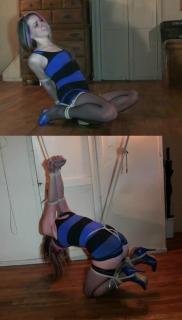 Bambi - Shy coed kidnapped and hung in a brutal crotch-splitting strappado Hunters Lair - Shy and cute coed Bambi sits tightly bound in his basement, her arms are fused completely together with ropes behind her back. Her legs are cruelly frogtied with her heels pulled up to her tight little ass. The Hunter comes in an stuffs a pair of panties into her mouth then seals the gag in tight with layers of vet wrap. He goes for more rope and Bambi is left struggling helplessly on the floor. He returns and ties a tight crotch rope between her legs and pulls her up onto her knees. Her bound wrists are attached to a rope he has tied to some overhead pipes. He pulls her wrists up high behind her back twisting her poor shoulders painfully back. Her crotchrope is then attached to another rope hanging from the pipes and he pulls it tight until she is up onto her knee points to take the pressure off the crotch rope. (12:19 minutes) 