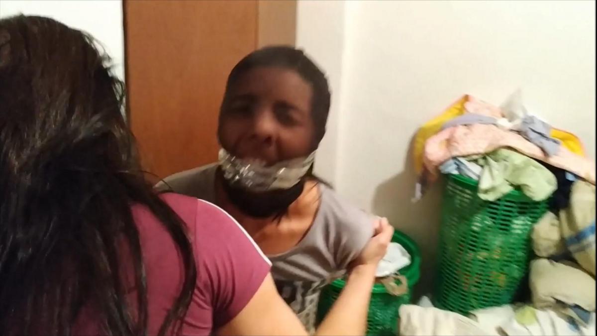 Laura &amp; Maria Martinez in: Fucked Up By Step-Mom: From Pretty Little Princess To Pantyhose Hoode From: SELFGAGS<br>Description:<br><br>Get ready to experience a serious transformation where step-mommy's pretty little princess is turned into a pantyhose hooded, hogtied and humiliated little piggy girl in minutes!<br><br>Maria is tape bound, handgagged and dominated by her real life step-mom Laura as the scene opens. Laura ruthlessly toys with nineteen-year-old Maria's whining mouth with slapping and smothering before she teasingly flaunts a white pair of panties in front of Maria.<br><br>Laura crams the white panties in Maria's mouth, drags a pair of pantyhose down over her head and cleaves layers of tightly wrapped packaging tape into her stuffed mouth and around her head as the first step in turning her lovely little step-daughter into a piggy girl.<br><br>Step-Mom Laura toys with her step-daughter's gagged and nylon encased face by slapping her and laughing at her before she picks her up to be carried over her shoulder. Laura carry Maria over her shoulder and spanks that sweet little ass strutting right up into the open air. Then Laura brings Maria into the other room and puts her on a table.<br><br>Laura grabs a roll of duct tape and hogties Maria on the table. Then the pantyhose encasing Maria's face is tightly pulled all the way back and tied to her ankles by step-mom Laura who makes sure that her step-daughter's  head and nose is held up high!<br><br>Layers of clear tape is then wrapped around Maria's ankles, over her forehead and back around her ankles again to secure the position of her head looking straight out into the air. A really uncomfortable and painful position for the young nineteen-year-old princess who's now become a helpless little piggy girl!<br><br>Maria is drooling, tickled, spanked, kissed and generally humiliated by her step-mom who really got her step-daughter completely fucked up incredibly good!