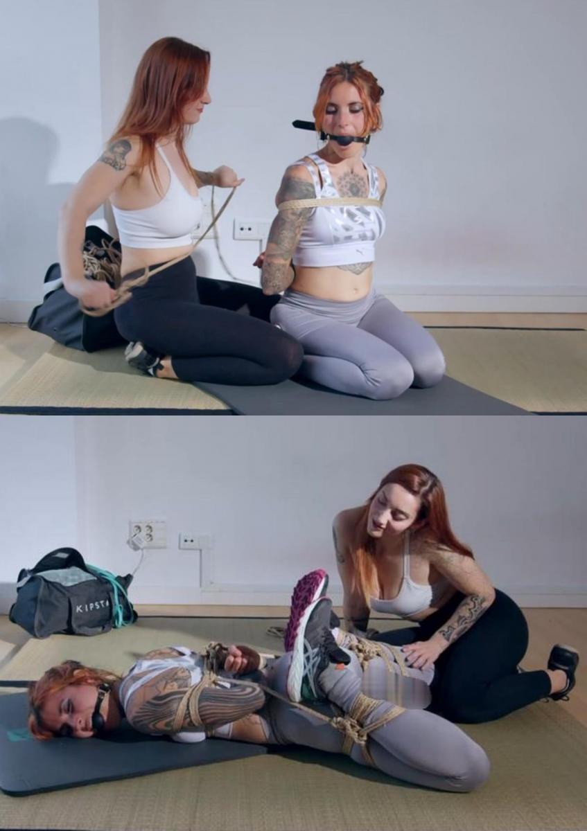 Hogtied Yoga Class (4K): Brighid gets bound orgasms after class! Brighid正在和她的老师Margout Darko一起上私人瑜伽课。两个女孩都穿着瑜伽服和紧身瑜伽裤，伸展身体，抬起臀部。Margout命令Brighid弯腰，然后从她的运动包里抓起一根绳子，用另一只手捂住Brighid的嘴。布里吉德对这种情况感到非常困惑和愤怒，所以试图逃跑，但没有成功。然后Margout把Brighid的手（shibari/kinbaku/绳带束缚）绑在背上，并解释说Brighid在他们最后一次见面时背叛了她，她即将复仇。Margout用一个黑色皮革的插科打诨给Brighid插科打趣，并把Brighid绑在一条严格的领带上。然后Margout拿了一根魔杖，在Brighid的[X_X]玩，直到她决定把魔杖绑在胯部，这样她就无法逃脱。Brighid开始多次[X_X]。Margout让Brighid独自一人挣扎着扎着辫子，并达到了一定的[X_X]。Brighid is taking private yoga classes with her teacher Margout Darko. Both girls strech their bodies and raise their butts while wearing yoga clothes and tight yoga pants. Margout orders Brighid to bent over and then grabs a rope from her sports bag and puts her other hand over Brighid's mouth. Brighid gets very confused and mad by the situation so tries to escape with no success. Then Margout ties Brighid's hands (shibari / kinbaku / rope bondage) on her back and explains Brighid she betrayed her last time they met and she is about to take her revenge. Margout gags Brighid with a black leather ballgag and ties Brighid on a strict hogtie. Then Margout gets a magic wand and plays with it on Brighid's pussy until decides to tie it to her crotch so she can't escape it. Brighid starts to have multiple orgasms. Margout leaves Brighid alone struggling on hogtie and having bound orgasms.