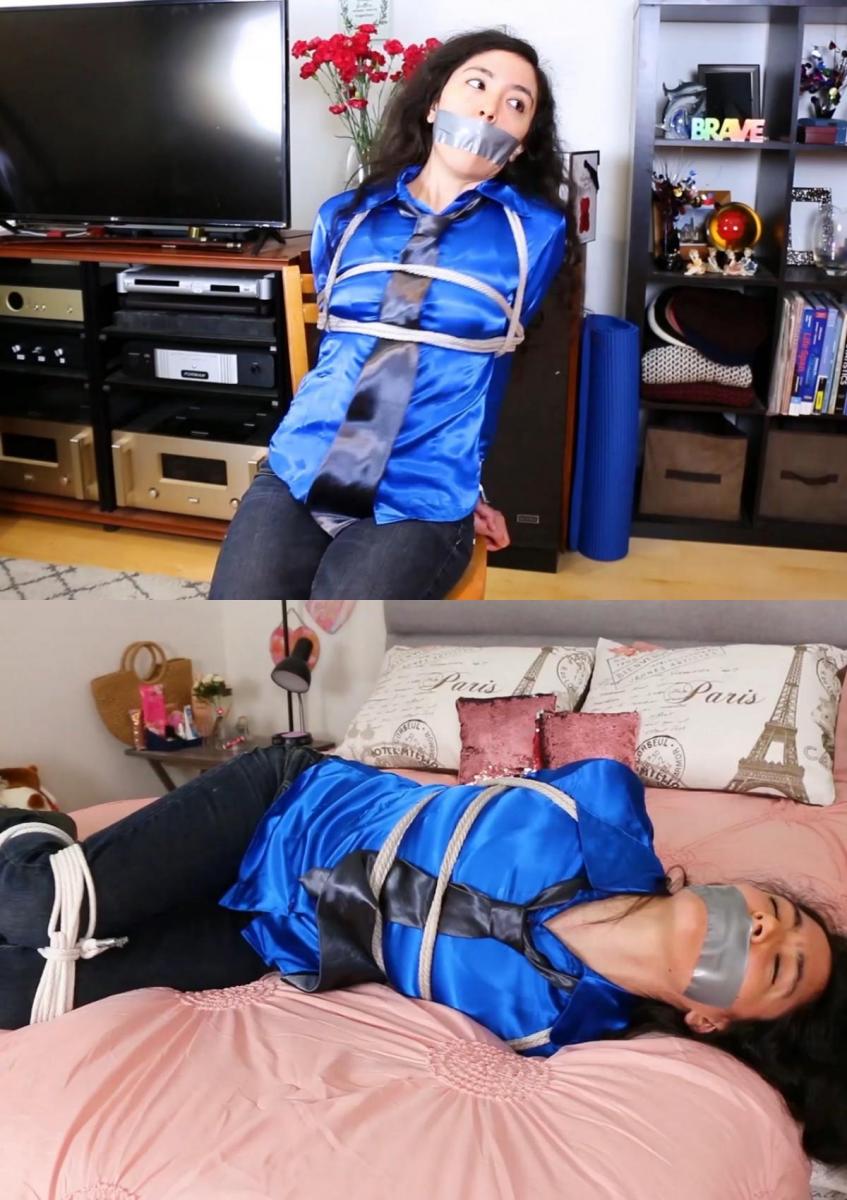 The bondage misfortune of Khrystal, she owes money to the mafia so they keep her tied and gagged unt The bondage misfortune of Khrystal, she owes money to the mafia so they keep her tied and gagged until she pays! INCLUDES BEHIND THE SCENES 这个版本的视频包括幕后：两次逃跑挑战，一次是用绳子绑着克里斯托尔并塞住嘴，另一次是戴着爱尔兰手铐逃跑<br><br><br><br>Khcrystal犯了一个巨大的错误：她向一些坏人贷款，现在他们想要回他们的钱，但Khcrystel没有！所以他们派了一个坏人来讨债！坏人闯入Khcrystal的公寓，抓住她的手臂将她的双手绑在背后，然后用绳子绑住她的身体和腿。每次Khcrystal试图解释她的情况时，坏人都会捂住她的嘴，他不想知道她要说什么！在Khcrystal被完全绑住后，坏人用一条胶带堵住了Khcrystel的嘴。Khcrystal穿着闪亮的缎面衬衫、领带、牛仔裤和靴子，会花一两天的时间把自己绑起来，塞住嘴，直到坏人决定怎么处置她！This version of the video includes behind the scenes: two escape challenges one with Khrystal tied with ropes and gagged, and other escape challenge with irish handcuffs<br><br>Khrystal made a huge mistake: she asked a loan to some bad guys and now they want their money back but Khrystal doesn't have it! So they send a bad guy to collect that debt! The bad guy breaks into Khrystal's apartment and grabs her arms to tie her hands behind her back, then ties her body and legs with rope. Every time Khrystal tries to explain her situation the bad guy covers her mouth, he doesn't want to know what she has to say! After Khrystal is completely tied up, the bad guy gags Khrystal with a strip of duct tape. Khrystal, who wears a shiny satin blouse, tie, jeans and boots, will spend a day or two all tied up and gagged until the bad guy decides what to do with her! 