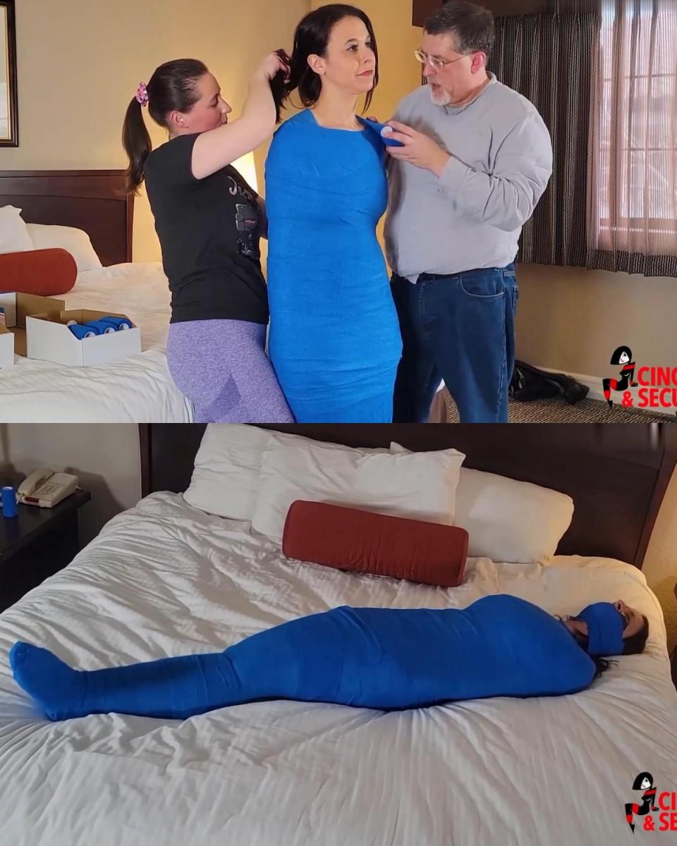 Sarah Gregory Wrapped and Robbed (MP4 Format) Sarah和Minx Grrl正在享受一段“女孩时光”，这时话题转向了放松和健康问题。Sarah最近压力很大，非常想找到一种放松的方式。Minx Grrl建议她去水疗一天，但Sarah不愿意花这么多钱。幸运的是，Minx Grrl认识一个可以帮忙的人！当他到达时，他开始把莎拉从头到脚裹在一个奇怪的蓝色绷带茧里。当这个男人用胶带封住她的脸，并在她的嘴上裹上更多的紧身绷带时，她甚至都不介意！当Minx Grrl和那个男人把她抱到床上时，她觉得自己好像在漂浮！然而，当Minx Grrl解释Sarah所有的珠宝和钱都在哪里时，这个男人开始把她的脚紧紧地裹在一起，Sarah开始感到不安！看来莎拉就要被抢劫了！当她躺在那里，被困在那里，扭动着，她只能惊恐地看着这对情侣拿走了一切，把她独自一人，无助地留在茧里！她扭动着身体，大声呼救，但胶带和包裹在她嘴上的东西让她几乎听不见！看来这种“治疗”根本无法减轻她的压力！Sarah and Minx Grrl were having a little "girl time" when talk turned to relaxation and health matters. Sarah has been VERY stressed as of late and was desperate for a way to relax and unwind. Minx Grrl suggested she treat herself to a spa day, but Sarah was reluctant to spend so much money. Fortunately, Minx Grrl knew a guy who could help! When he arrived, he began to wrap Sarah from head to toe in a strangely soothing cocoon of blue bandages. It was so soothing she didn't even minds when the man sealed her face with tape and wrapped more of the tight bandage around her mouth! She felt as if she were floating when Minx Grrl and the man lifted her onto the bed! However, Sarah began to grow uneasy when the man began wrapping her feet together tightly as Minx Grrl explained exactly where all of Sarah's jewelry and money were! It seems that Sarah was about to be robbed! As she lay there, trapped and squirming, she could only watch in horror as the pair took everything and left her alone, helpless, in the cocoon! She squirmed and called for help but the tape and wrapping over her mouth rendered her nearly inaudible! Looks like the "treatment" wasn't going to reduce her stress after all!