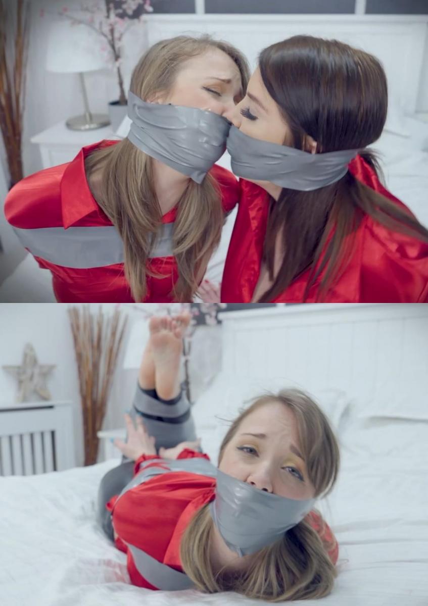 Terri &amp; Missy - Figting Over a Guy for a Date MP4 HD 场景开始时，特丽抓住了穿着同一套衣服的米西。米西一直喜欢和特丽一样的人。米西很快就被迷住了。她试图抗议特丽的统治，但她只能发出低沉的插科打诨的声音。她被更强壮的特丽压倒了。特丽抓起一卷胶带，开始用胶带重重地绑住米西。米西现在只能合作，通过她那紧紧固定的插科打诨发出尽可能多的声音。特丽一直在贬低米西，把她放在自己的位置上。米西挣扎着挣脱束缚，感到无助和沮丧。她希望自己早点站出来，后悔让特丽控制了自己。当所有的捆绑都完成后，terri去掉了可怜的missy的插科打诨，想再教训missy一次。她用一条内裤把嘴里塞得满满的，然后在嘴里放了一大块Tegaderm胶带。米西现在只能发出MMMMM-PPPPHING的声音，而特丽一直在嘲笑她。米西现在非常无助，她尽最大努力发出尽可能多的声音。特丽一边梳头，一边完全控制着米西。Terri给自己装了一个胶带包裹的呕吐物，因为她在这种情况下是可以控制的，当她完成后，她也会把胶带包裹的排泄物紧紧地绑在Missys的嘴上。米西试图抗议，但没有用。特丽一点也不改变主意。特丽对米西有完全的控制权，所以她想试着在他们都发出很多插科打诨的谈话声音的时候接吻。米西作为一个DID和Terri的享受。特丽把米西扔在床上，想和她再接吻一次。Terri在Missys已经裹得严严实实的下半张脸上加了一个红色缎面OTN插科打诨。当她做完这一切后，她决定再接吻一次，以表明谁是这里的老板。Missy MMMMM PPPPHSSS无助地挣扎在她那紧紧的胶带束缚中。特丽去掉了她自己的插科打诨和米西的OTN插科打骂。她把米西绑得严严实实，继续约会，米西计划用米西的烟来对付她，但她嘴里说的只是低沉的插科打诨。米西竭尽全力摆脱沉重的磁带束缚，发出尽可能多的声音，希望有人能听到并救她。但她所有的尝试都是徒劳的，她所能希望的就是特丽能尽快回来并释放她。米西在与严密的胶带束缚作斗争时感到被背叛和无助，希望特丽能尽快回来 The scene starts with Terri catching Missy in the same outfit. Missy has been liking the same guy as terri. Missy is quickly ballgagged She tries to protest against the domination by Terri but she can only make muffled gag talk sounds. She is overpowered by the stronger Terri & Terri Grabs a roll of tape and starts tying Missy heavily with the tape. Missy can only cooperate now and produce as much sound as possible through her tightly secured ballgag. Terri Keeps talking down to Missy putting her in her place. Missy feels helpless and frustrated as she struggles to break free from the tight restraints. She wishes she had stood up for herself earlier and regrets letting Terri take control over her. When all tying is done terri removes the ballgag of poor missy and wants to teach Missy another lesson. She stuffs her mouth heavily with a pair of panties and puts a big piece of Tegaderm Tape on her mouth. Missy now only able to produce MMMMMPPPPHING sounds does that while Terri keeps taunting her. Missy now very helpless does her best producing as much sound as possible. Terri brushes her hair while she has full control over Missy. Terri Gags herself with a duct tape wrap gag since she is in control in this situation and when she is done she tightly secures a duct tape wrap gag around Missys mouth as well. Missy tries to protest but its of no use Terri isnt chenging her mind a bit. Terri has fulll control over Missy so she wants to try out some gagged kissing while they both produce a lot of gag talk sounds. Missy as a DID and Terri of enjoyment. Terri Throws Missy on the bed to have some more gagged kissing fun with her. Terri adds a red satin OTN gag to the already heavily wrapped lower half of Missys face. When she is alll done with that she decides on some more gagged kissing to show who is the boss here. Missy MMMMMPPPPHSSS and struggles helplessly in her tight tape bondage. Terri Removes her own gags and the OTN gag of Missy. She leaves missy fully tied and goes on the date that Missy had planned Missy fumes against her but all that is coming our of her mouth is muffled gag talk. Missy does her best struggling out of the heavy tape bondage producing as much sound as possible hoping somebody wil hear and rescue her. But all her attempts are fultile all she can hope for is for Terri to return fast and release her.   Missy feels betrayed and helpless as she struggles against the tight tape bondage, hoping for Terris quick return