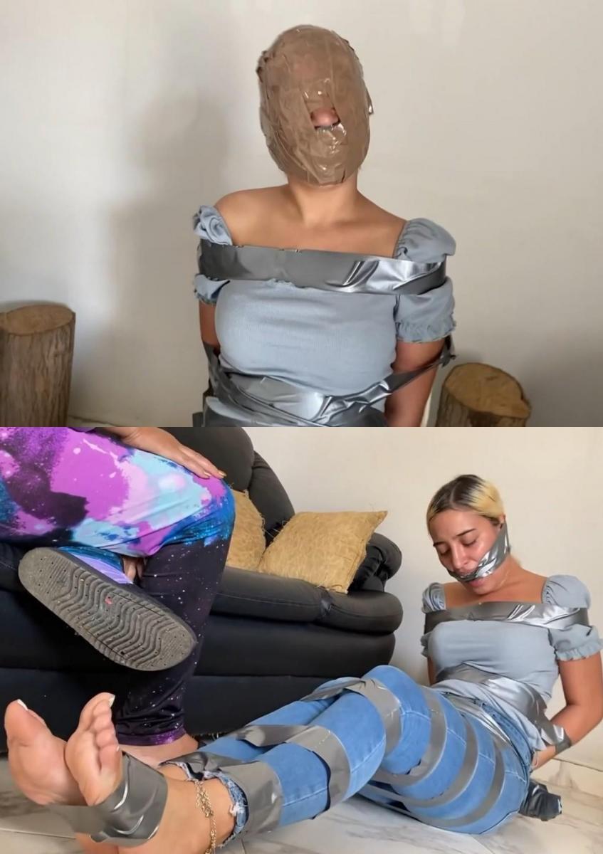 Lau & Jessi in: I'm Here To Be Tied Up By You! (high res mp4) 性感的金发女郎杰西戈麦斯回应了一则广告，广告中有一个古怪的女人（刘）正在寻找可以搭讪的女孩。 Jessi 出现并自愿被一个对女孩有特殊癖好的女人绑起来！ Jessi 把手放在自己的脏袜子里，全身用胶带紧紧包裹。 她的嘴被成熟恋物癖女人穿的脏袜子塞住，并用胶带绑在她的头上裂开进入她的嘴里！ 这位可爱的志愿者为测试她的胶带束缚做出了很好的努力，这很快让她意识到自己变得多么无助。 然后她坐在椅子上，并有效地用胶带粘在椅子上，使她更加无法动弹！ 这位热爱束缚的女人穿的另一只新鲜的脏袜子被小心地塞进 Jessis 的嘴巴里，在她的嘴巴外面用多层胶带缠绕在她的头上以盖住它！ 双重堵嘴，被束缚的少女真的是堵死了，什么话也说不出来。 但最重要的是，这名妇女抓起一卷棕色包装胶带，将被胶带绑住的女孩整个头部——包括她的眼睛——包起来，只留下鼻子让她呼吸Sexy blonde Jessi Gomez responded to an ad where a kinky woman (Lau) was looking for girls to tie up. Jessi shows up and volunteers to be tied up by the woman who has a special fetish for girls in duct tape bondage! Jessi gets her hands encased in her own dirty socks and her entire body duct tape wrapped tight. Her mouth gets a dirty sock gag worn by the mature fetish woman and cleaved into her mouth with tape tied around her head! The sweet volunteer gives a nice struggle to test her tape bondage which quickly makes her realize how helpless she has become. She is then sat in a chair and effectively duct-taped to it to make her even more immobilized! Another fresh dirty sock worn by the bondage-loving woman is carefully packed into Jessis cleave gagged mouth on the outside of her gag and securely tape wrap gagged with multiple layers of duct tape winded around her head to cover it up! With the double gags in place, the bound girl is truly all gagged up and cant say a damn thing. But to top it all off, the woman grabs a roll of brown packing tape and wraps the tape-tied girls entire head - including her eyes - leaving only her nose free to allow her to breathe