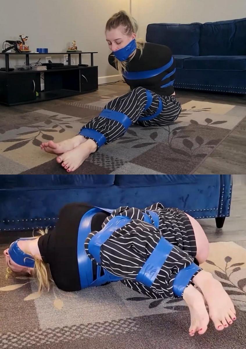  Persephone Tangled Up In Blue (Tape) - MP4 Format 瘦长的 Persephone 陷入困境 - 真的！ 一个小偷闯进了她的家，用非常结实粘稠的蓝色胶带把她绑起来了！ 想要呼救，却被罪犯的肉手紧紧捂住她性感的小嘴，叫声都被[X_X]了，她的眼睛疯狂地四处乱转，寻找逃生的途径。 幸运的是，窃贼松开了她抓着她脸的手（尽管他暗自喜欢她的嘴唇在他手掌下蠕动的感觉）。 珀耳塞福涅放弃了一次寻求帮助的机会，而是选择威胁窃贼。 她的话被忽略了，当他把她的嘴巴塞得快要裂开时，她很快就[X_X]了，然后用更多可怕的胶带封住了她的嘴！ 他无情地将它紧紧地缠绕在她的头上，压力让珀耳塞福涅在她的眼前看到了星星。 更要命的是，她连一句抗议的话都说不出来！ 窃贼确信他的包裹现在已经安静且安全，窃贼任由她抽打、蠕动、扭动和扭动，希望能松开她的束缚！ 她赤着脚弓起身子，伸伸懒腰，脚趾因用力而扭动弯曲，但她被牢牢地卡住了。 最后，窃贼回到了无助的女孩身边，将她的身体弯成了一个紧凑的小团，并在她身上缠绕了更多的胶带，将她的身体紧紧地困在一个无助的球里！ 他通过拉下她的裤子进一步羞辱她，让她的屁股只穿着丁字裤，暴露给任何设法找到她的人！Long, lean Persephone is in a bind - literally! A burglar has broken into her home and bound her with incredibly strong and sticky blue tape! As she tries to call for help, her shouts smothered under the meaty hand of the criminal which was clamped tightly over her sexy mouth, her eyes darted about wildly for a means of escape. Mercifully, the burglar released her grip on her face (although he secretly loved the feel of her lips squirming beneath his palm). Persephone threw away her one chance at summoning help by choosing instead to threaten the burglar. Her words were ignored and she was quickly stifled as he packed her mouth to bursting, then sealed her mouth shut with more of the awful tape! He wound it mercilessly tight around her head, and Persephone saw stars before her eyes from the pressure. Worse still, she could not utter a single word of protest! Confident his package was now silent and secured, the burglar left her to thrash, squirm, wriggle and writhe in hopes of loosening her bonds! She arched and stretched her bare feet, her toes wriggling and flexing with the effort, but she was stuck fast. Finally, the burglar returned to the helpless girl, bending her body into a compact little mass and winding still more tape around her form, trapping her body in a tight, helpless ball! He further humiliated her by pulling her pants down, leaving her bottom, clad only in a thong, exposed for whoever did manage to find her!