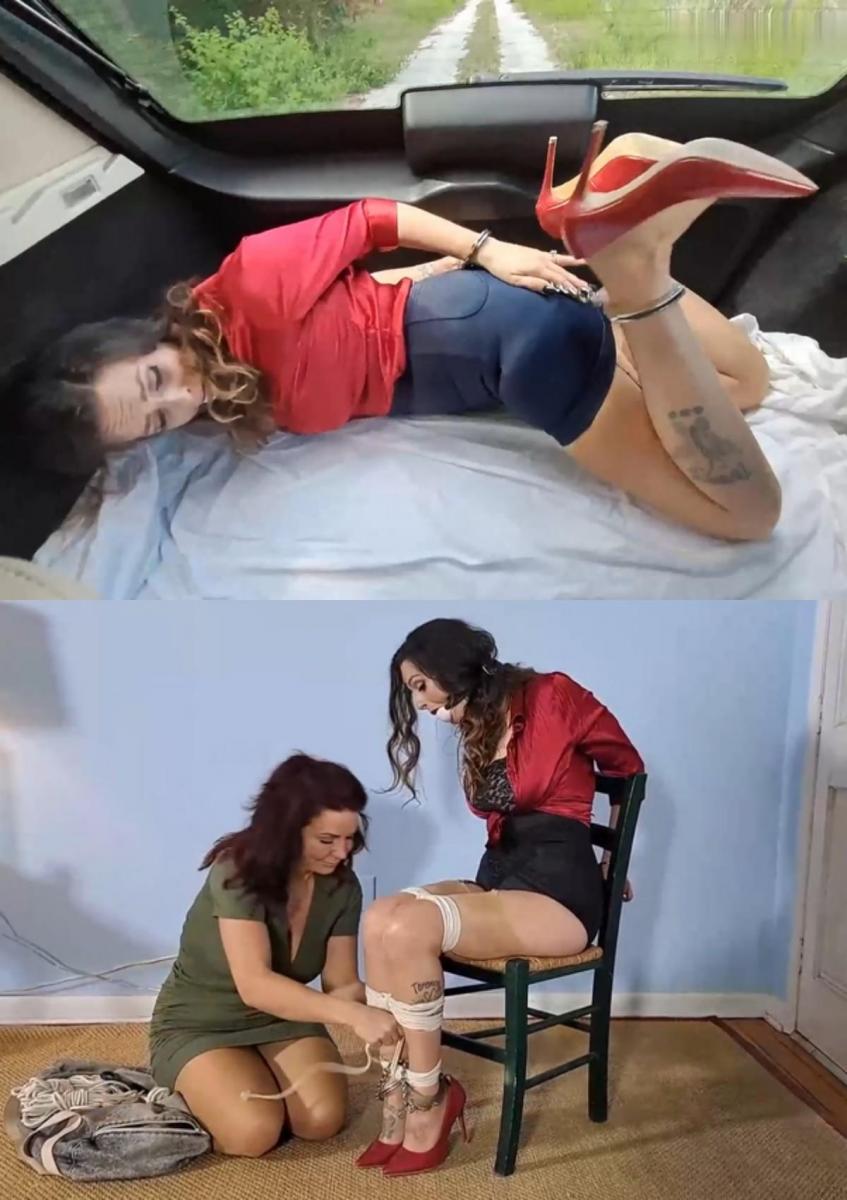 Trespasser all trussed up 娜塔莉·查姆 (Natalie Charm) 是 JJ 老练的邻居，JJ 是一个垃圾女人，她的财产上有很多抛锚的汽车和其他垃圾。 娜塔莉想让她离开附近，然后过来窥探。 JJ 正在等她，Natalie 很快发现自己被铐在一辆 SUV 的后座上，在崎岖不平的土路上滚来滚去。 她被带到另一个地方，松开手铐，走进了家里。 一旦她的裙子被脱掉，上衣系在腰间，她就不得不在金属束缚中来回走动。 然后她坐在椅子上。 手铐还在，但她被绑在椅子上。Natalie Charm is the sophisticated neighbor of JJ, a trashy woman with a lot of broken down cars and other junk on her property. Natalie wants her out of the neighborhood and comes over snooping. JJ is waiting for her and Natalie soon finds herself hogcuffed and ballgagged rolling around in the back of an SUV on a bumpy dirt road. She is taken to another place, let out of the hogcuff and walked into the home. She has to pace around in the metal bondage once her skirt is removed and her blouse is tied up around her waist. Then she sits down in a chair. The cuffs stay on but she is tied to the chair.