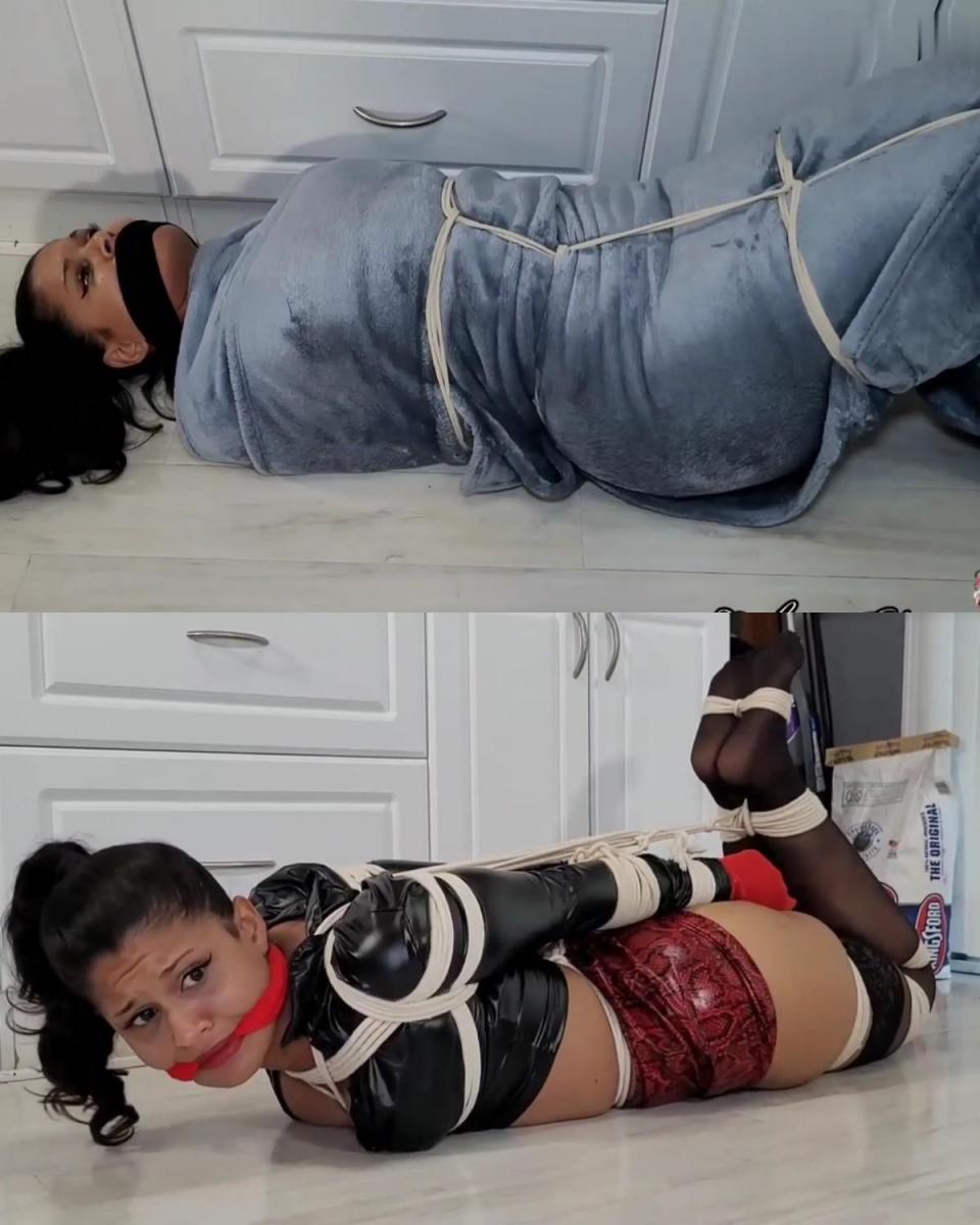 Blanket Mummy 卡丽莎发现自己被绑得很紧。 她用袜子遮住双手，还用袜子堵嘴。 她挣扎了很长时间，直到能够松开绑带。 她试图解开剩下的绳子，但袜子阻止了她这样做。 她决定最好的行动计划是……Calisa finds herself in a tight hogtie. She has socks covering her hands and a sock cleave gag as well. She struggles around for a long time until she is able to release the hogtie. She tries to untie the remaining rope but the socks prevent her from doing so. She decides the best plan of action is to...
