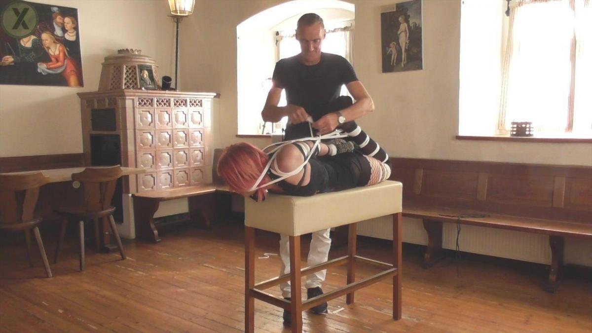 The Red Bat Hogtie Full Clip mp4 Rigger Mario visits feisty model StrongPanda for a nice time together and at some point they decided to do some bondage in their old historical buliding. Strongpanda had a very special outfit for this, but.. oh well you have to see it yourself. <br>Mario just quickly ties her wrists at first and then ties her legs on countless places all ropes cinched securely. StrongPanda is physically pretty fit and even somewhat atlethic but very flexible at the same time. Mario used this flexibility against her as he ropes her arms from high on biceps to wrists with lots of rope which cuts deeply into her skin. Still they're joking and laughing when he flips her onto her stomach on a bench and starts to backarch and hogtie her her. Even the small soles of her pantyhosed feet are tied together and pulled into the hogtie. She is even gagged with rope while her head gets tied to the hogtie as well. Mario decides to makee her even more uncomfy and helpless when he pulls the hogtie up to an hook at the ceiling and at the same time, ties her stomach to the bench - making her totally immobile. <br>She complains into her gag much to Marios entertainment..