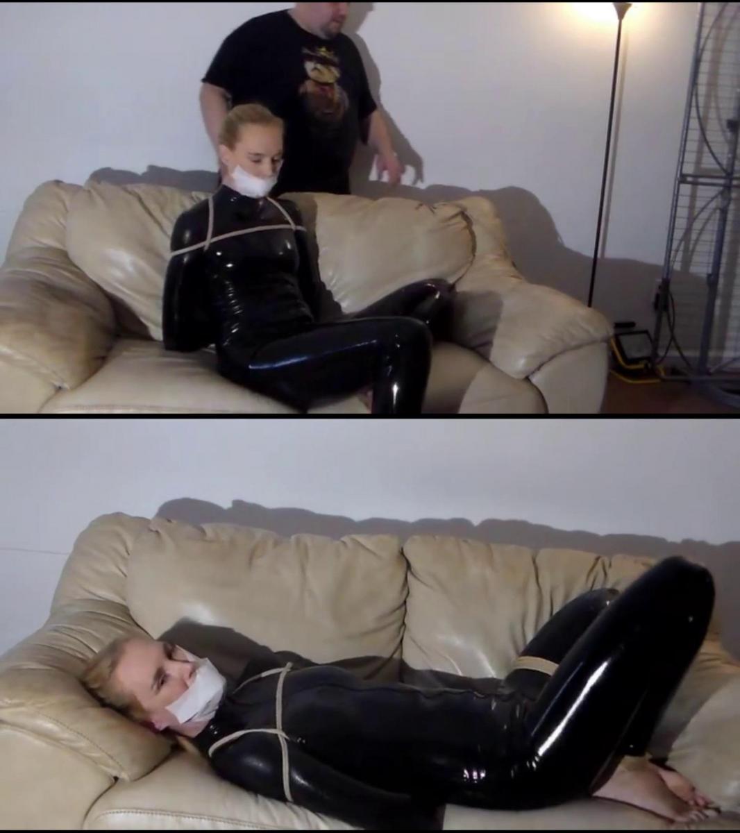 Ariel Anderssen: Latex Superspy Bound and Gagged 英国捆绑超级宝贝爱丽儿扮演一名秘密特工，被捆绑进行训练。 她穿着紧身黑色乳胶服装，就像超级间谍经常做的那样。 然而，当她被捆绑并堵住嘴时，她的训练师透露了他的秘密议程，并开始抚摸这位无助的美丽。 她能成功逃脱吗？ British bondage superbabe Ariel plays a secret agent getting tied up for a training exercise. She is wearing a skintight black latex outfit, as superspies often do. As soon as she is bound and gagged, however, her trainer reveals his secret agenda and begins to grope the helpless beauty. Will she manage to escape?