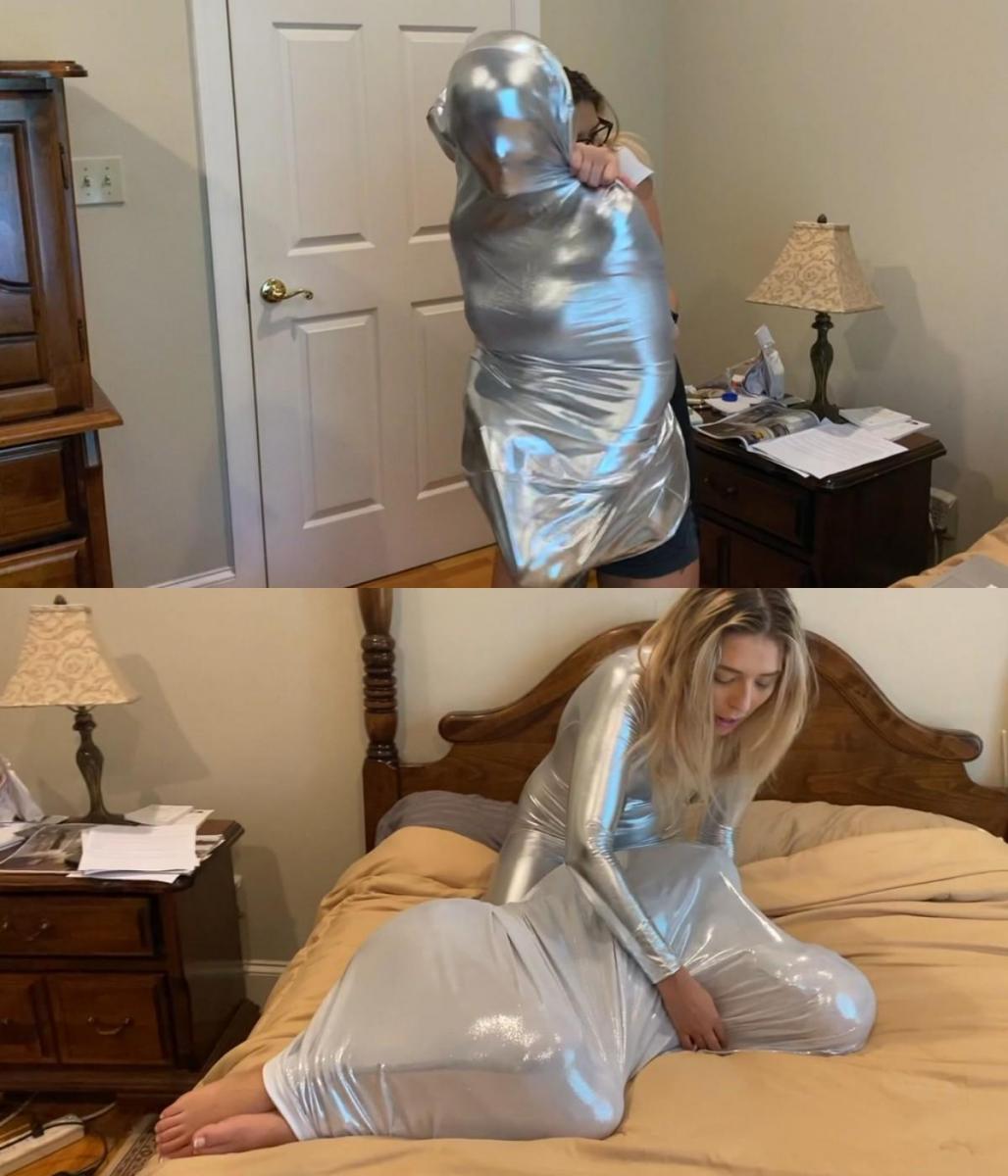 Birthday Dress 这一集的生日礼服真是令人惊叹。 这是一个又一个的惊喜，你不想错过。 模特 Rosie Satin 和 Blake Lavista 甚至在结局中也有一些幕后动作。<br><br>这一集的生日礼服非常精彩。 惊喜不断，你不想错过！ 模特 Rosie Satin 和 Blake Lavista 甚至在结局中也有一些幕后动作。<br><br>场景开始时，布莱克在卧室里兴奋地自言自语，谈论她买的、刚刚邮寄过来的一件非常昂贵的生日礼服。 她计划晚上出去。 好吧，就是这样，直到邪恶的罗西进来，欺骗她相信银袋是她的衣服。 她扭曲并操纵了真相，直到布莱克发现自己处于一种非常不受欢迎的境地——被捆绑、堵住嘴、裹着银布，然后独自留在那里！This episode of Birthday dress is a stunner. It is one surprise after another and you do not want miss it. Models Rosie Satin and Blake Lavista  even have some behind the scenes action in the ending.<br><br>This episode of Birthday Dress is a stunner. It has one surprise after another and you do not want miss it!  Models Rosie Satin and Blake Lavista even have some behind the scenes action in the ending. <br><br>The scene begins as Blake is excitedly talking to herself in her bedroom  about a very expensive birthday dress she had bought and had just come in the mail. She has plans to go out in the evening. Well, that is, until the evil Rosie comes in, and tricks her into believing a silver sack is her dress. She twists and manipulates the truth until Blake finds herself in a very undesirable situation- bound, gagged, wrapped in a  silver sheet, and left there all alone!
