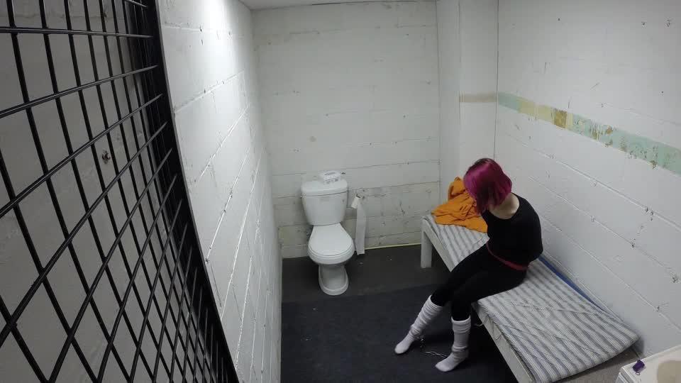 Slap on wrist becomes felony for Anastassia part#2  Anastasia is cuffed behind the back waiting at the police intake 