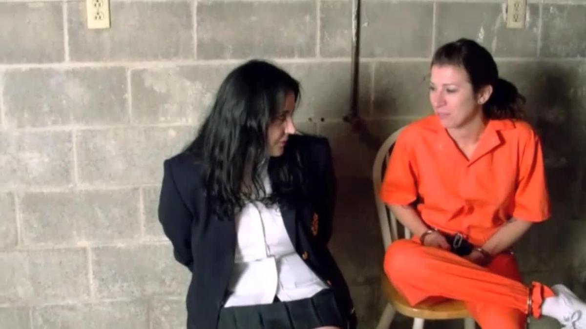Rich Girl Taught a Lesson part#2 Erica is taken upstairs to change into a jail uniform before she gets transported to the jail. She is brought back down handcuffed behind the back