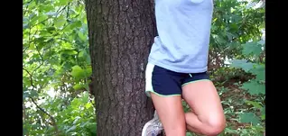 Kidnapped Blonde Girl Girl is kidnapped and tied to a tree in a forest.