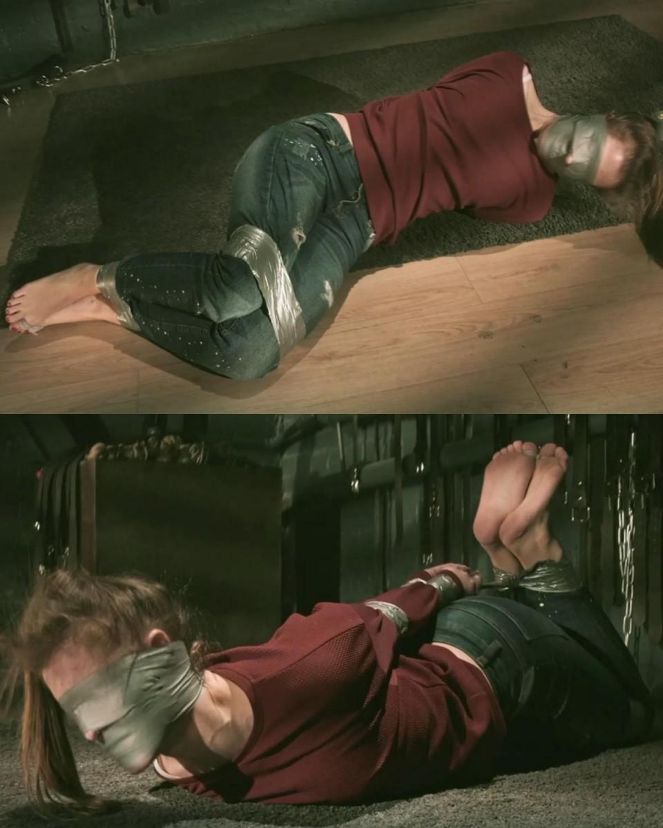 Leya in a sticky situation - Struggle and deprivation in the tight embrace of tape - Part 2  在这一部分中，索具工继续扣押莱娅。<br>这位赤脚美女仍然被捆绑着，她的手腕和脚踝都被胶带紧紧束缚在黑暗、寒冷的地牢里。 她的眼睛和嘴巴也被胶带封住。 她赤着脚，大脚趾被自己的鞋带紧紧地绑着。<br><br>莱娅试图逃跑，但她所能做的只是挣扎和透过胶带堵住的低声哭泣。 在视频的前半部分，莱娅在地板上打滚，手腕、肘部、脚踝和膝盖都被绑在一起，而在后半部分，她被绑住了，但这丝毫不妨碍她拼命挣扎、战斗。 为了她的自由。 但操纵者就在附近某处，正在密谋着什么……<br>享受！In this part, the rigger continues to hold Leya captive.<br>The barefoot beauty remains bound and has to stay in a dark, cold dungeon tightly bound with tape around her wrists and ankles. Her eyes and mouth are also taped shut. She's barefoot and her big toes are tightly tied with her own shoelace.<br><br>Leya tries to escape, but all she manages are struggles and muffled cries through the tape gag. For the first half of the clip, Leya writhes on the floor with her wrists and elbows taped together, as well as her ankles and knees, while in the second part, she is hogtied, which in no way hinders her from desperately struggling, fighting for her freedom. But the rigger is somewhere nearby, plotting something...<br>Enjoy!