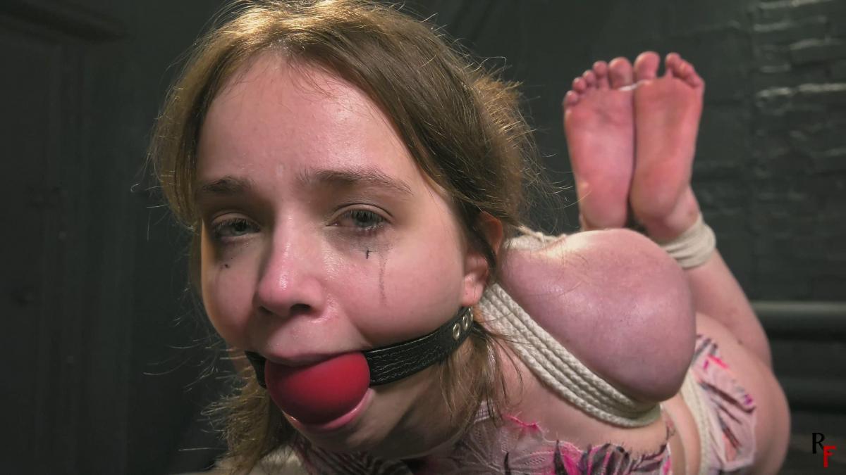 Arina - Bastinado dice game for strictly hogtied cutie (UHD 4K MP4) RF studio production<br>解压：<span style='color:#b0b0b0;'>[隐藏文字，购买后可见]</span><br>在这段视频中，Arina将被紧紧捆绑、堵住嘴巴，并被严厉的 bastinado 折磨得泪流满面。<br><br>短片开始时，约翰把被捆绑的 Arina 带到长凳上，游戏将在这里进行。所有设备都已准备就绪，长凳正等待着 Arina。<br>约翰带领阿丽娜向前走去。<br><br>她已经被绑得很紧了：<br>- 手腕被绑在背后<br>- 肘部被绑得很紧，以至于永远相互接触<br>- 肘部以下用另一根绳子绑在一起<br>- 上身捆绑得非常紧，肩部也是<br>- 手腕与胯下的绳索紧紧相连<br>- 双腿被紧紧捆绑<br>- 双脚被最大限度地捆绑在一起<br>- 阿丽娜戴着一个白色的大塞口套<br>- 袜子上用细绳绑着非常紧的脚趾<br><br>约翰向 Arina 介绍了等待她的 bastinado 装置，并解释了即将开始的游戏规则。在下一个场景中，Arina 发现自己被绑得非常紧。她的嘴仍然被堵着，脚上穿着绑着脚趾的袜子。<br><br>约翰在阿丽娜面前放了三颗骰子（在手机上）。然后给她一分钟时间脱下两只袜子。在这 60 秒内，她每脱一只袜子，就会有一个骰子被移除。约翰开始计时，我们看着 Arina 尝试。计时器响起，它停留在三个骰子上......<br><br>然后，约翰为阿里娜准备游戏：<br>- 他取下球袋<br>- 他把两只脏袜子深深地塞进 Arina 的嘴里。然后，约翰用一根细胶布非常频繁、非常紧地缠绕在阿丽娜的头上，使袜子深深地塞进她的嘴里。<br>- 约翰又用细绳绑住她的脚趾。脚趾绑得又非常非常紧。<br>- 约翰用绳子或皮绳连接她的头发和手肘。头部向后拉伸到最大限度。<br><br>游戏开始：<br>约翰拿起一把骰子，给阿丽娜看，然后掷骰子。然后，Arina 全力以赴、不间断地掷骰子。任何声音都会让我们重复一轮。<br>然后约翰拿起下一个骰子，再次掷骰子。以此类推......<br>每种韧带工具都要用到--所以我们的阿丽娜有六轮：皮带、橡皮绳、木制手杖、黑色长马鞭、单尾鞭。<br>对于火炬，我们使用时间。骰子上的每个点代表五秒钟的烤脚时间。<br><br>The bonus round:<br>After Arina has done the six bastinado-tools John praises her.<br>He explains to her that he has a bonus round for her. He's about to open her gag. For each sock she has made wet with her spit, Arina will receive 50 very very hard strokes with the single-tail whip. If both socks are dry, there will be no strokes. He opens the hair-tie and the gag. Of course both socks are a little bit wet somewhere.<br>This means Arina gets another 100 strokes with the single-tail whip.<br><br>But before we start John gets the larger ballgag. He straps the huge ballgag very tightly into Arina's mouth.<br>Then he connects the ballgag with Arina's elbows. Arina's head is again pulled back as far as possible and the ballgag is pressed into her mouth to the maximum.<br>Now Arina is allowed to make noises during these strokes. But she will be given two tasks:<br><br>1. The camera will be placed close in front of Arina's head. Thereby we see Arina's face and her feet at the same time on screen. Arina must look at the camera during the entire 100 strokes. She must not direct her gaze in any other direction. Penalty: plus extra 50 strokes.<br>2. Arina must not drool. She must keep all her saliva in her mouth.<br>Penalty: plus extra 50 strokes.<br><br>After the bonus round John connects the hair-tie to the toe-tie and leaves Arina. There are some last close-ups of Arinas bondage and her lovely soles.<br><br>During the game, Arina's soles turned a beautiful shade of red, and the sweetheart even shed tears at the 21-minute mark from the belt spankings. Enjoy!