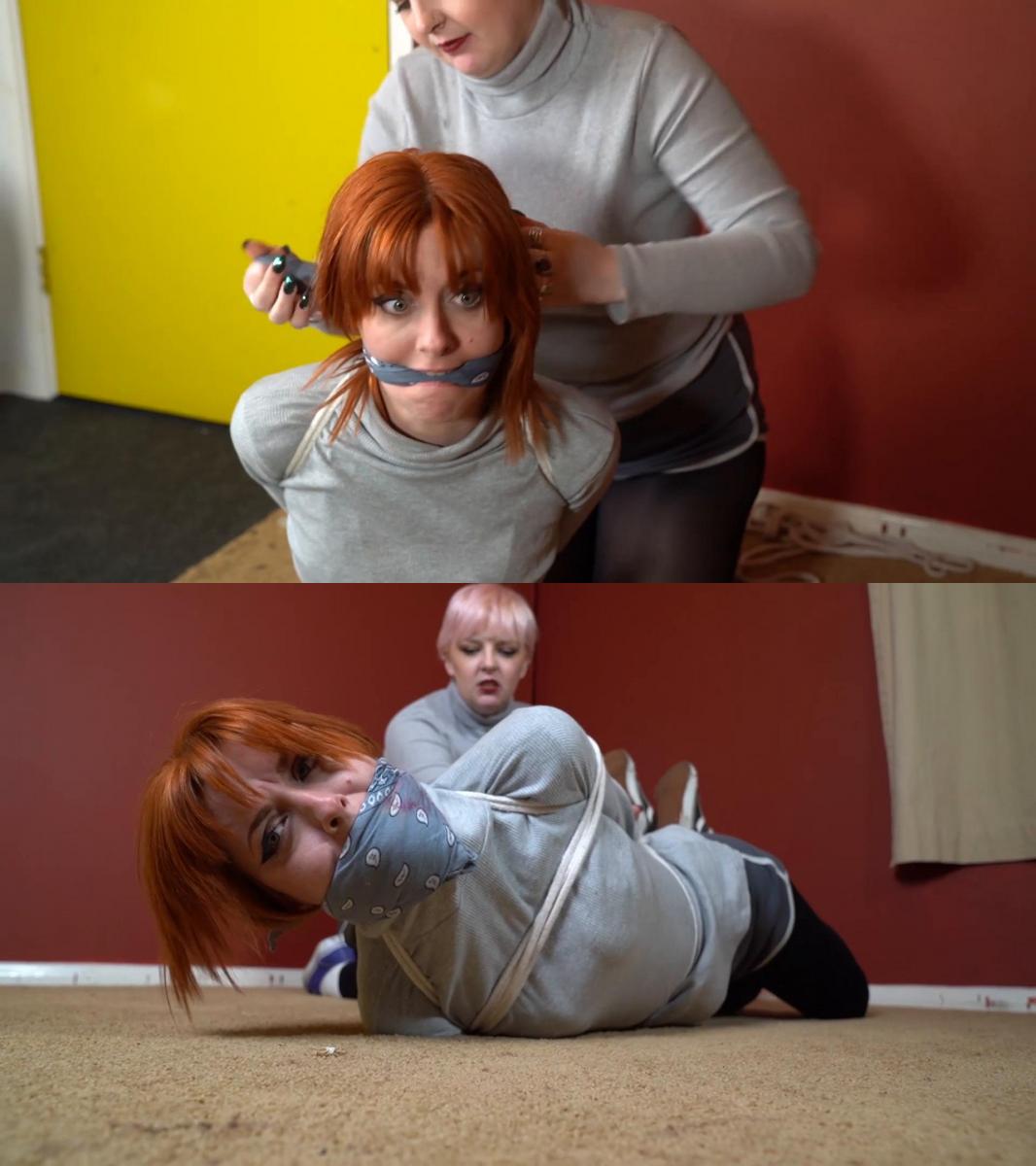 2021b Amber and Roxie in Roxies Return Part 2 没有办法让安珀保持安静。 塞进袜子和使用胶带还不够。 安布尔蠕动着，吐出了罗克西试图让她保持安静的所有努力。 但我们会像您一样继续努力。<br><br>There is just no keeping Amber quiet. Stuffins socks and using tape isnt even enough. Amber wriggles and spits out all attempts by Roxie to keep her quiet. We keep on trying though, as you do.