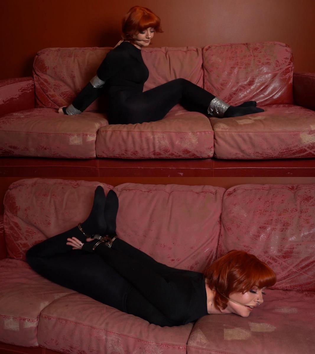 3026 Amber in Tights and Cuffs and Tape 琥珀色是一套完整的紧身衣服装。 紧紧地铐着，袖口被胶带取代。 还使用薄裂口。 她奋力拼搏！ Amber in is a total tights costume. Tightly hogcuffed, the cuffs are replaced by tape. A thin cleave gag is also used. She struggleshard!