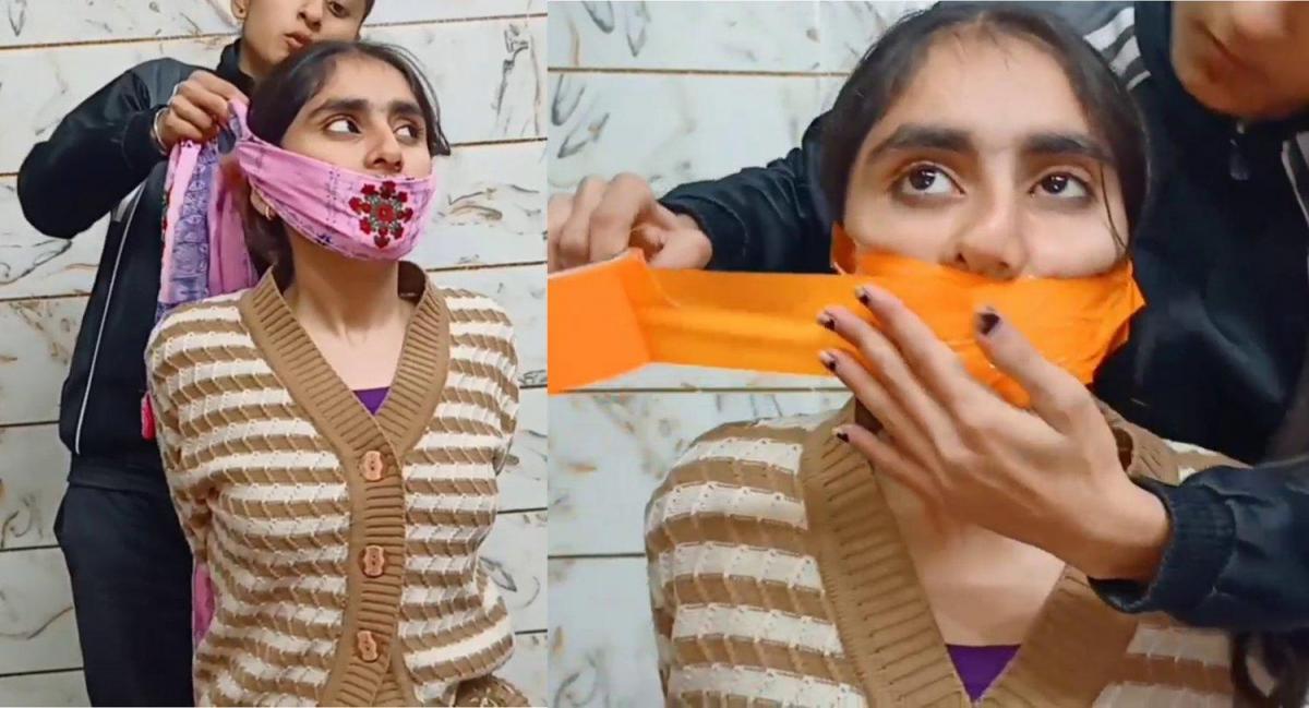 Indian girl gagged by her jealous sister - Part 2 Title: Indian girl gagged by her jealous sister - Part 2<br><br>Description: Shilpa is jealous of her other sister Priya who wants to steal her boyfriend. So she decides her to teach a lesson by tying and gagging her. She initially gags her with a scarf but then decides to shut her mouth completely with a duct tape wrapped around her mouth.