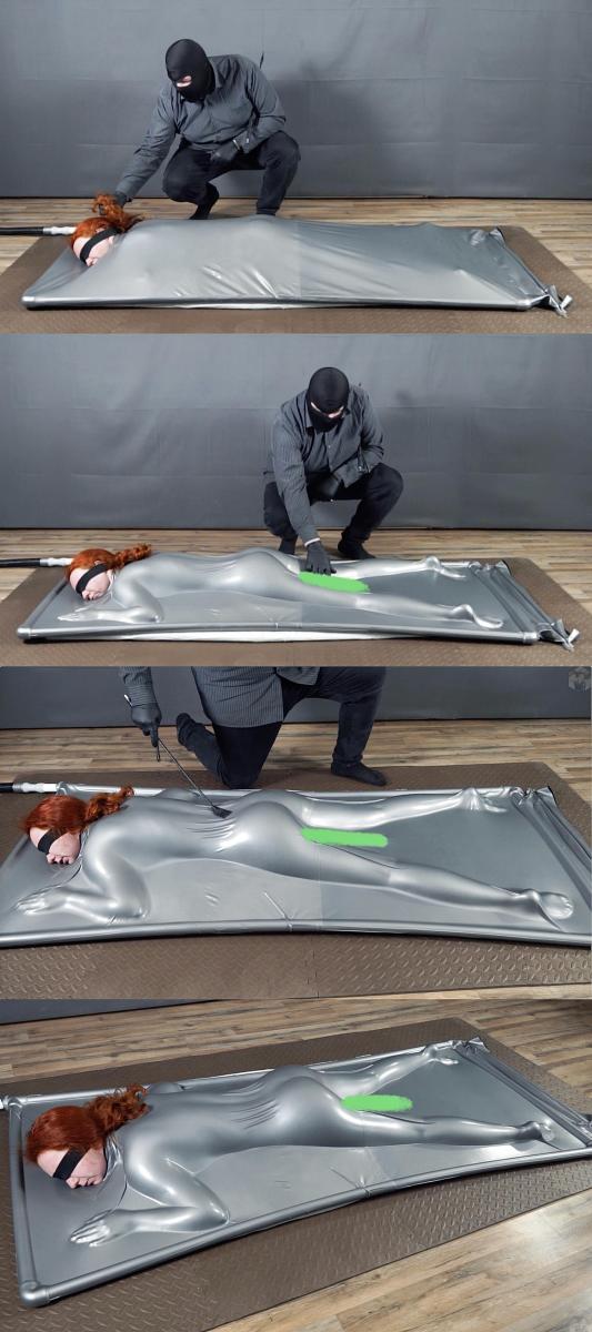 Flogging in a gray latex bed upside down with vibro and eyes closed 小姐姐趴在真空床里，抽空气，利用真空压力固定住两腿间的快乐棒。<br>一边享受真空床的紧致吸附包裹，一边享受快乐棒带来的强烈糕潮，一边被主人用皮鞭打屁屁。<br>小姐姐一边呻吟一边扭动，简直爽歪歪。