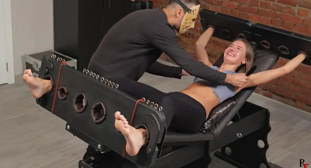 RFStudioProduction – Lali – Upper body and belly button tickling for 18 yo cutie In this clip, the charming 18-year-old Lali finds herself restrained on a bench in stocks, setting the stage for a thrilling tickle test.<br><br>With a playful glint in my eye, I step into the role of the curious tickler. My mission? To explore her upper body’s ticklish potential. We start with her ears – surprisingly ticklish. The gentle touch of feathers sends little shivers down her spine, prompting a mix of bashful giggles and sweet squirms.<br><br>Moving on to her armpits, the atmosphere becomes electric. Laughter bubbles forth, a blend of shyness and delight. Each ticklish reaction exposes her vulnerability in the most endearing way.<br><br>Her tummy becomes the next target, a landscape of muffled laughter and charming wriggles. Her belly button emerges as a particularly ticklish spot, each touch evoking a gasp or a giggle that’s nothing short of adorable.<br><br>Though her feet are spared in this clip (btw her feet are visible and she points her toes cutely), the focus remains on her upper body. Her ribs take the spotlight, fingers dancing along her sides, creating a laughter-filled melody that perfectly captures her authentic reactions (still shy and timid).<br><br>In this escapade, her bashful nature adds an extra layer of charm. So, if innocent ticklishness is your jam, dive into this fanfic for a shorter yet thrilling adventure that’s bound to make you smile!