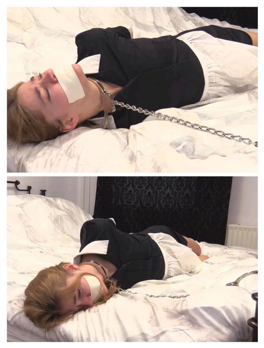 Maid Annika Stole My Watch mp4 4k Gorgeous Blonde maid Annika has been told to clean the bedroom and as she walks in she ses a very nice metal wristwatch. she picks it up and decides to put it on, she fastens the bracelet shut and she loves just how heavy it is. Annika is a snoop and likes to look through things and not before long she starts going through the drawers on the dressing table. not much to see here until she opens the second drawer and she finds neckcuffs, Anklecuffs and Handcuffs, she dosent even see the customer arrive and she finds herself with her hands handcuffed behind her back just as she thought it could not get any worse IT DID!!! she then finds herself hogcuffed with the set of anklecuff fastened between her arms and she is lying on her front with her legs pulled upto her hands, she wriggles around and starts to ask if theres anyone who can come and unlock her. she is struggling a little bit too much and he then locks a cuff around her neck and fastens her to the bed. she is now getting noisey so he then gags her with a strip of ducktape over her mouth, she tries to shout out but nothing happens. well thats what happens when you touch other peoples things!!