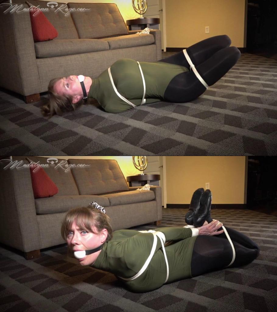 Madalynn Raye Ballet Slipper Bondage I 马达琳·雷伊 (Madalynn Raye) 身穿绿色长袖紧身衣、厚重闪亮的黑色紧身衣、皮革芭蕾舞鞋，在地板上系着一条舒适的小绑带，嘴唇间夹着一个白色的大口塞。<br>她挣扎着把口塞塞进去，努力不让口水流出来，也不让自己从湿点上扭开。<br><br>她胸部下方和上方的绳子让她的[X_X]在紧身连衣裤中突出，当它们摩擦在一起时皮革拖鞋的吱吱声足以让你在你从大白球塞子后面听到她低沉的 mmphh 时感到兴奋！<br><br>Madalynn Raye is dressed in a green long sleeved leotard, thick shiny black tights, leather ballet slippers and tied nice and tightly in a snug little hogtie on the floor with a large white ballgag between her lips.<br>She struggles and mmpphs through the gag, trying not to drool and wiggle away from the wet spots.<br><br>Ropes under and over her bust make her tits POP in that leotard and the squeaking of the leather slippers as they rub together is enough to send you over the edge as you listen to her muffled mmpphs from behind the big white ball gag!