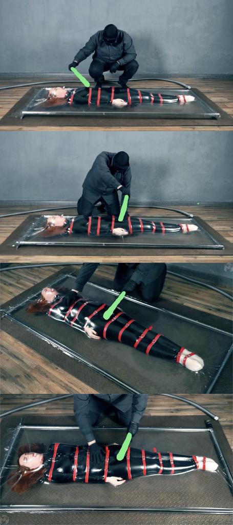Special agent trap with red straps in transparent vacuum bed with vibro 紧身衣女特工被坏人制服，用红色皮带结实的捆绑起来。<br>随后被塞进透明真空床，坏人拿出快乐棒，强高折磨女特工。<br>特工爽的在真空袋床里呻吟蠕动，时不时的还抽搐几下。