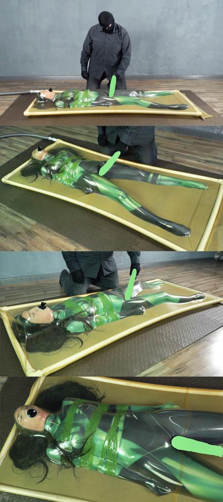Shego and fuel cell bondage with duct tape in a vacuum bed 绿衣女侠被邪恶人用光电绳索拘束，随后装进真空袋。<br>随着空气被抽干，真空袋紧紧的把女侠拘束了起来。<br>女侠愤怒的挣扎着，试图逃脱束缚。<br>没想到这时邪恶人拿出了快乐棒，直怼女侠裆部。<br>女侠被这突如其来的块感爽到了，"哦，好爽，还要！"