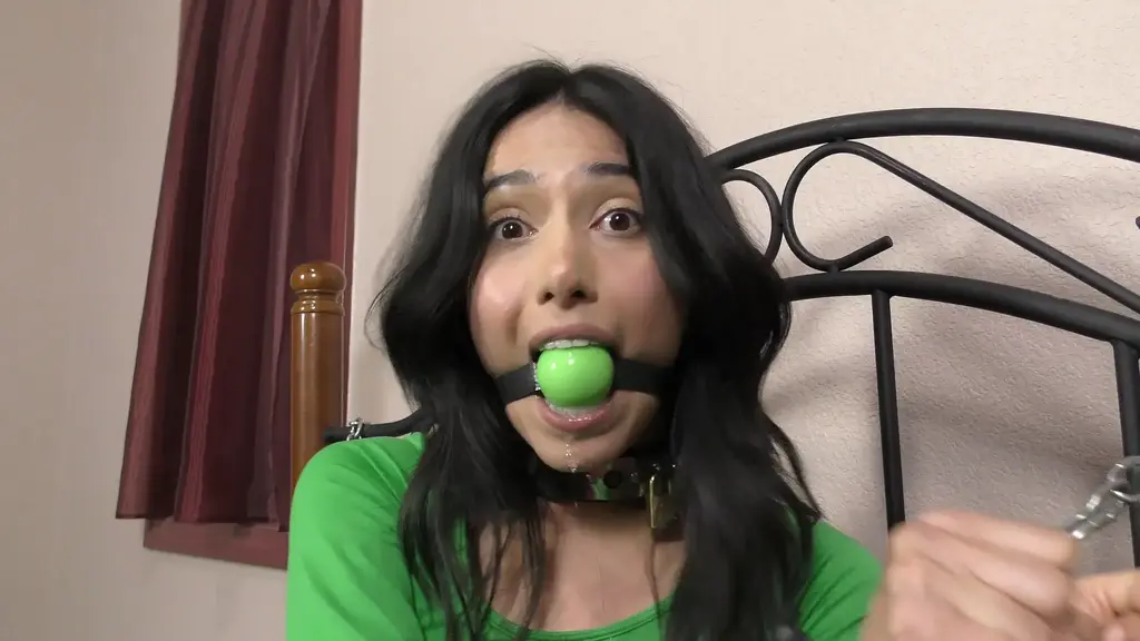 QT1192 Bethany Fontaine (is-qt-bf040) Bethnay is tied and then put in chains. She enjoys a lovely ball gag. She tells the story of how she was captured while she wears the gag. <br>