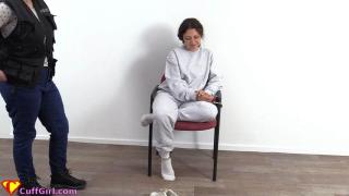 ( Cuffgirl ) Anahi - Prison sweatsuit Lovely Anahi got arrested by Zara in a grey Sweatsuit and is cuffed to a Chair. She also got legcuffs on, so that she's less likely to escape.