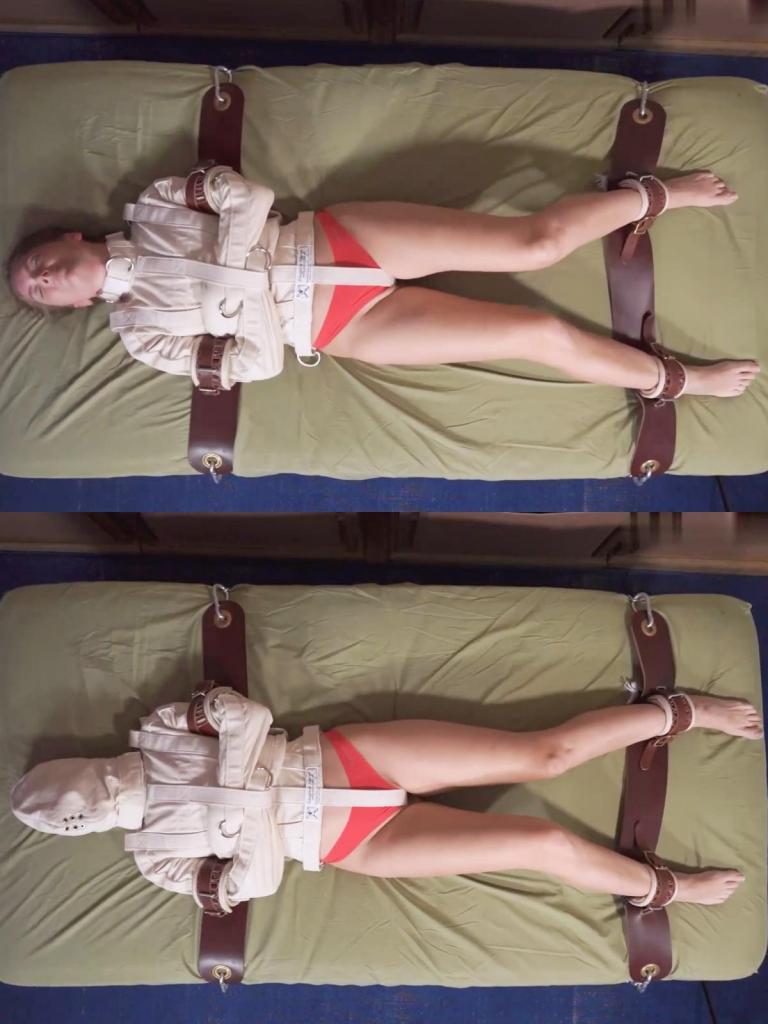 Bedtime for Rachel Adams Redux 这和《瑞秋·亚当斯的就寝时间》是同一个场景，但从侧面看，就像是拉起一把椅子来欣赏这场演出。瑞秋被困在一件紧身衣里，被医院的皮革手铐绑在床上。她试图逃跑，但没有出路。视频进行到一半时，她被戴上了头罩。现在她只能在完全黑暗中挣扎。主要以广角镜头呈现，并有一些特写镜头。This is the same scene as Bedtime for Rachel Adams but as viewed from the side as if one pulled up a chair to enjoy the show. Rachel is trapped in a straitjacket and strapped down to the bed with leather hospital cuffs. She tries to escape but there is no way out. Halfway through the video, a hood is added. Now all she can do is struggle in complete darkness. Mainly presented in a wide shot with a few close-ups. 