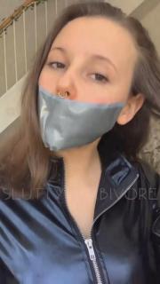 Ember Self Wrap Tape-gagged Ember aka Slutty Herbivore wraparound tape gags herself and fondles her boobs