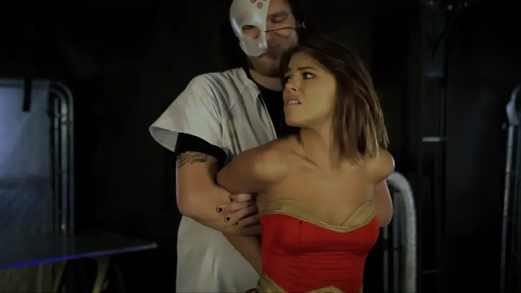 Resignation  Miss Wonder mighty Heroine responds to an anonymous tip to find an innocent victim at gunpoint. She recognizes the brilliant doctor on the other end of the trigger.