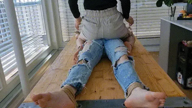 Cassie &amp; Kyra: Tickling Cassie on the table Cassie & Kyra: Tickling Cassie on the table<br>Our brand new models Cassie and Kyra decided to have some fun with each other.<br><br>Excited giggles filled the room as they prepared for their first tickling experience together.<br><br>In this first clip Cassie volunteered to be the first to be tied down onto the sturdy table.<br><br>Together with Kyra we securely tie her hands and feet to the corners of the very robust table.<br><br>Then Kyra starts to play with Cassie. On her feet, on her upper body, poking and teasing her but also being quite mean to her with some more intense tickling. There is also a bit of foot caning.<br><br>For a minute also the camera guy jumps in and helps to tickle her feet while Kyra is busy on the upper body.<br><br>Cassie was truly overwhelmed by the tickling sensations and it was clear from her constant begging that she couldn't handle much more.