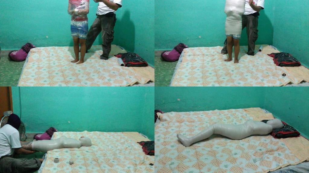 3 more minutes this girl is not breathing in a mummy pack A girl is mummified in her bedroom with her arms folded over her stomach.<br>After being helpless, this girl's breath hole was then wrapped in duct tape so she couldn't breathe.<br>This girl tried to hold on for more than 3 minutes until finally this girl was tight and struggled.
